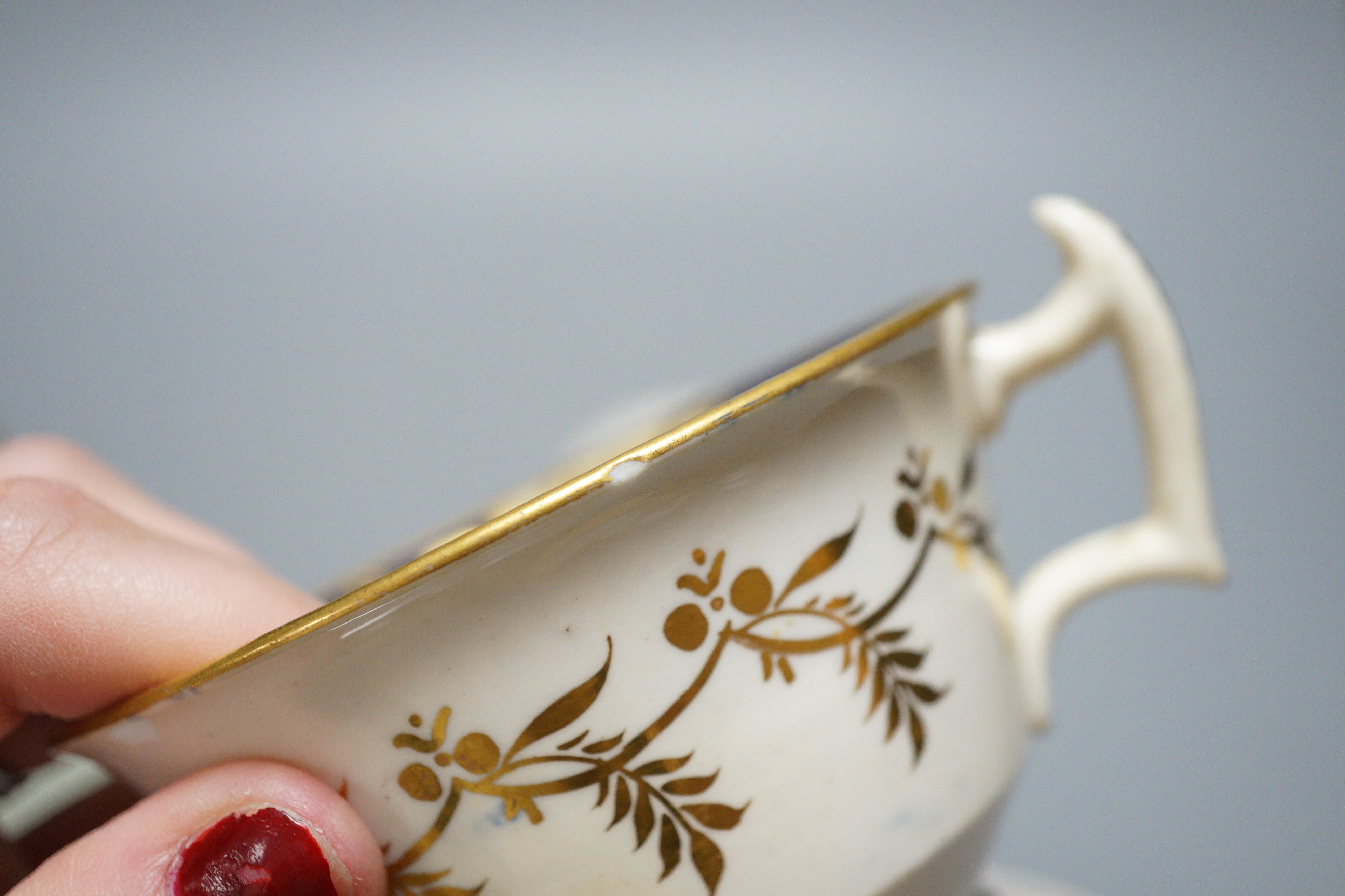 A small bone china pot pourri, possibly Spode, a relief moulded teacup and saucer, and three cups